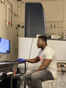 Okyem working in the lab